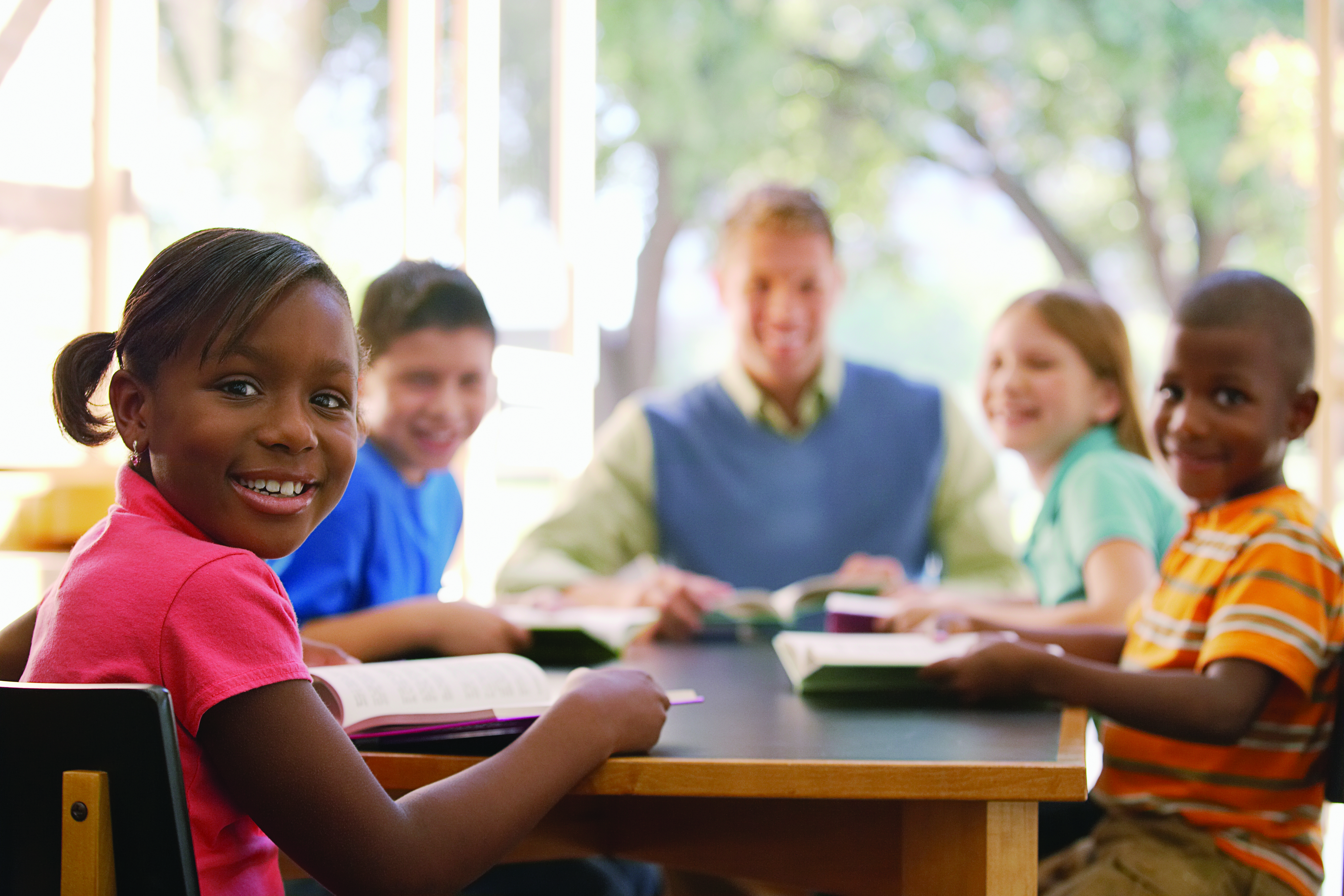 teacher and young students