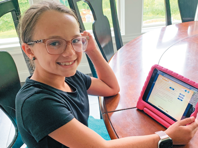 Midwest Elementary Testimonial Thumbnail - Student on tablet